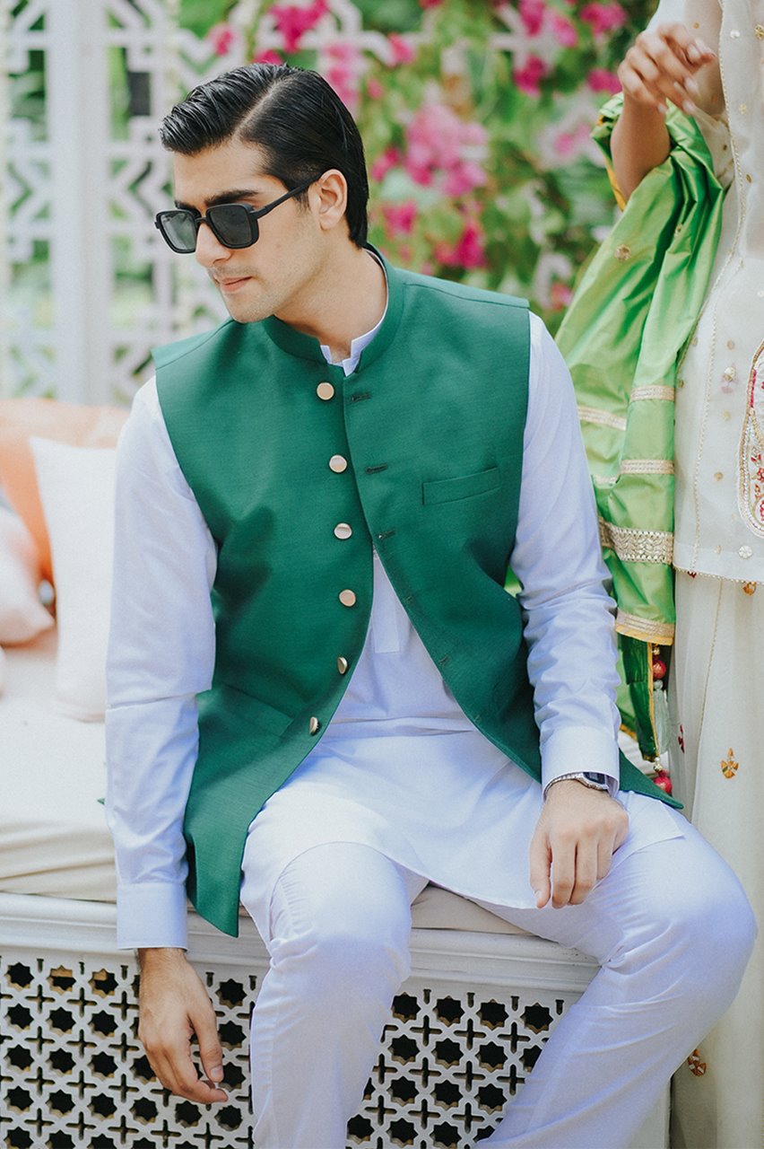 green waistcoat with shalwar kameez