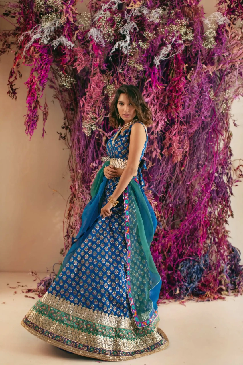 Electric Blue Tissue Silk Jacket Lehenga Set Design by Pooja Bagaria at  Pernia's Pop Up Shop 2024