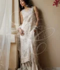 Parvaneh - Long cutwork kameez with Striped gharara and organza ruffle