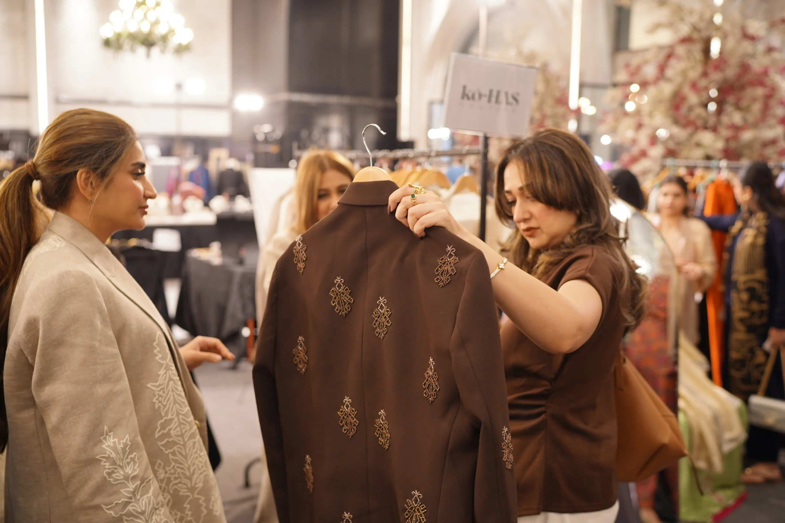 Shoppers browsing luxury formals at the Souk
